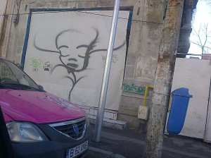 Vedere din Bucureşti. Romantic românul desenator pe ziduri născutu-sa. Foto cu telefonul: Călin Hera